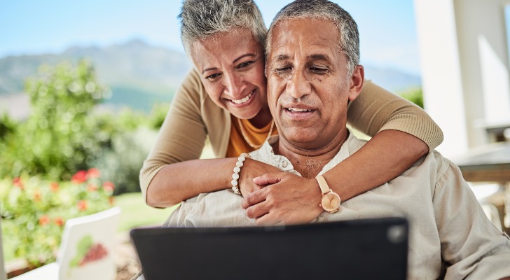 A senior couple reviewing their retirement plan.