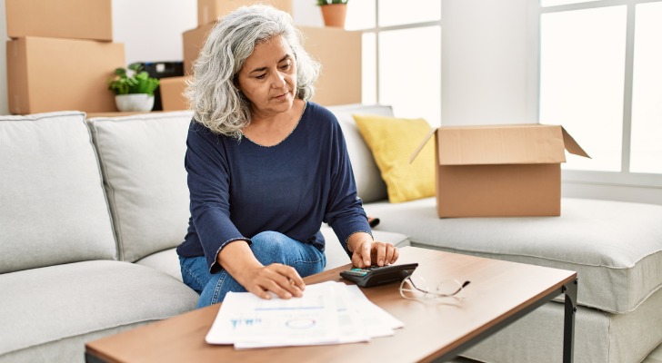 A senior reviewing the balance of her IRA.