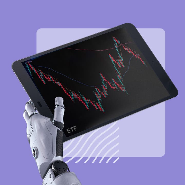 Robot arm holding a tablet with financial graphs