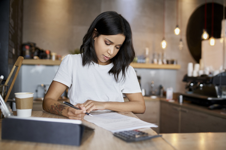 A woman applying for a tax credit.